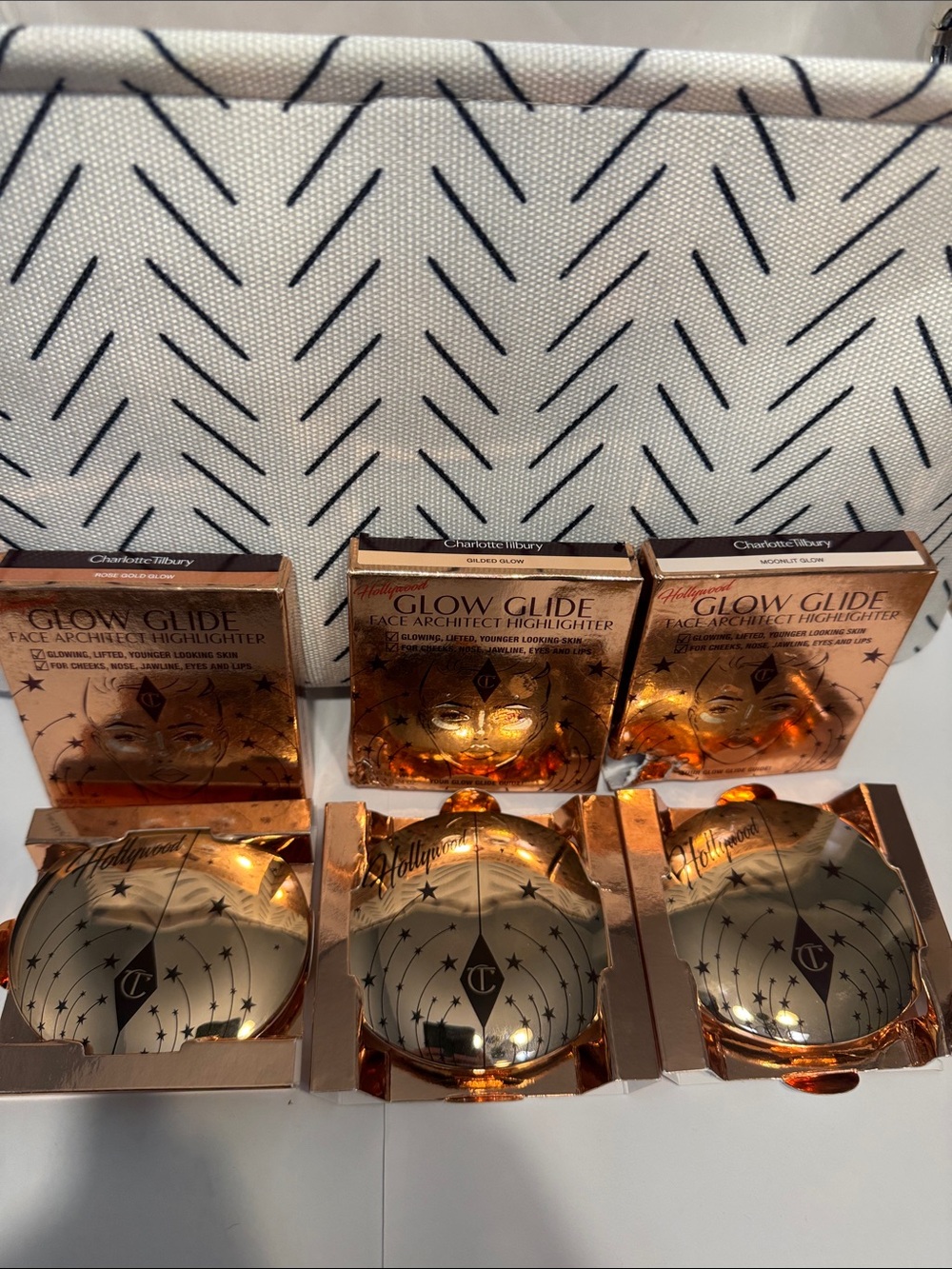 Charlotte Tilbury Glow Glide Compact Highlighters Trio- retail is $50 each
